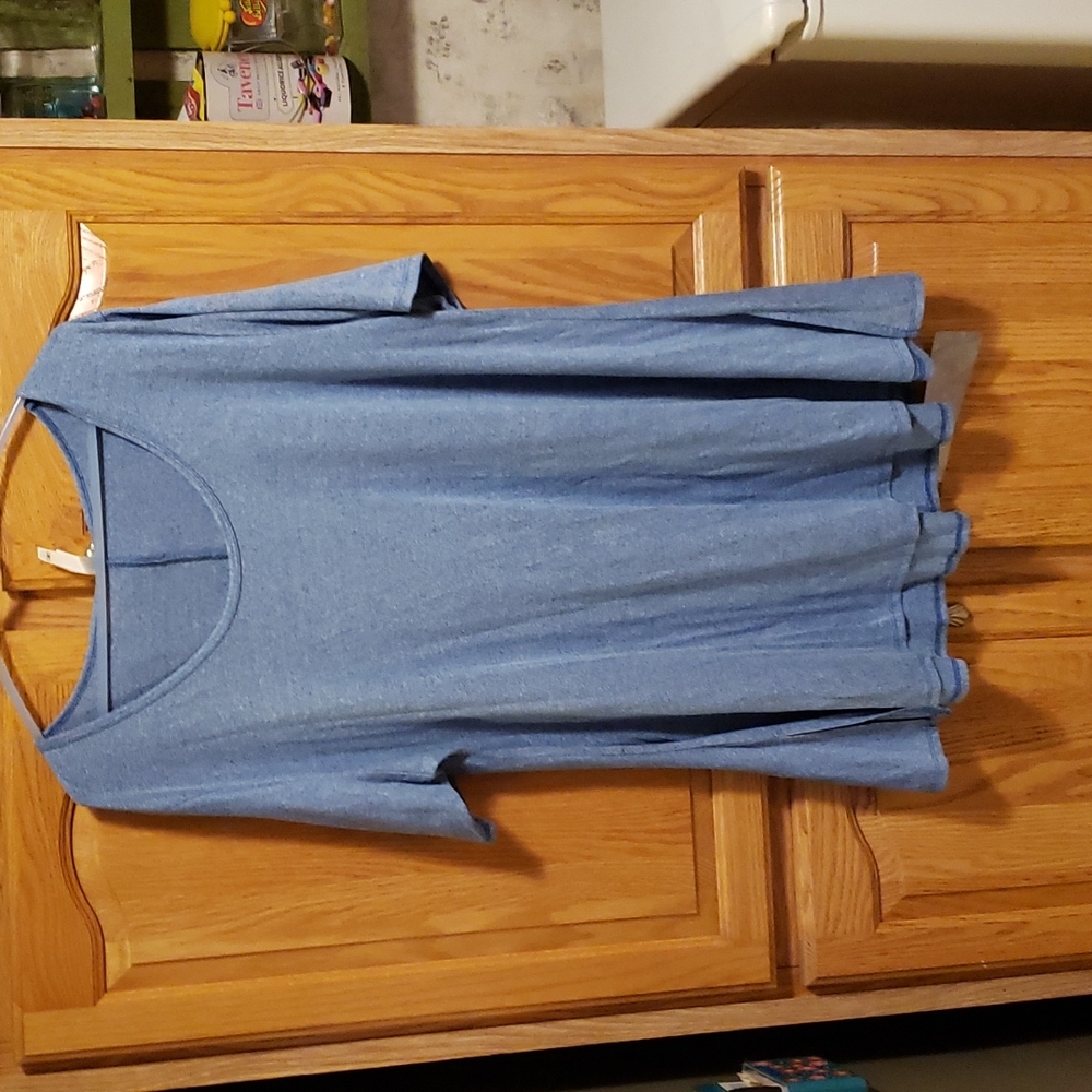 Like new. Very stretchy and comfy. .  Flares on bottom . Very soft